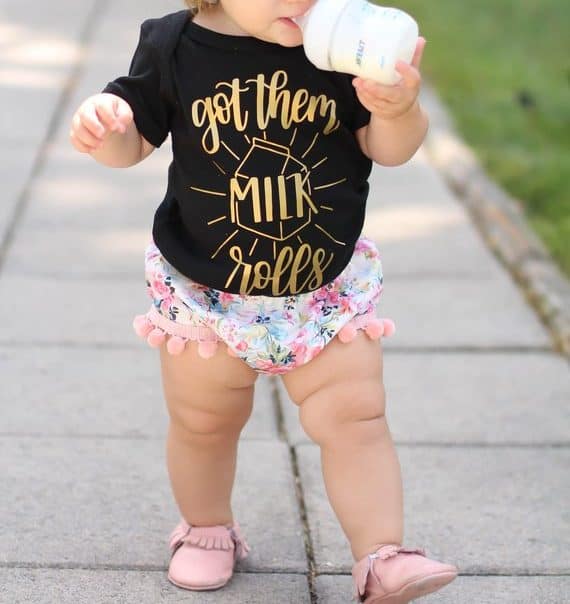 Cute breastfeeding onesie on a baby