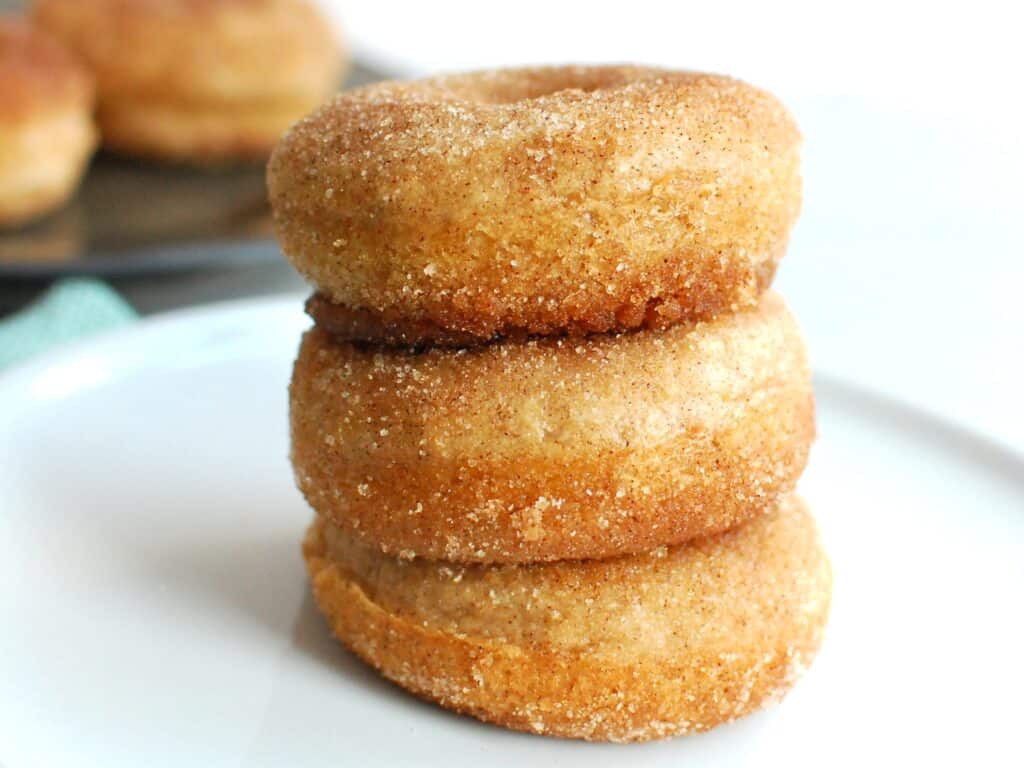 A stack of three dairy free donuts.