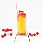 Mango raspberry smoothie in a glass