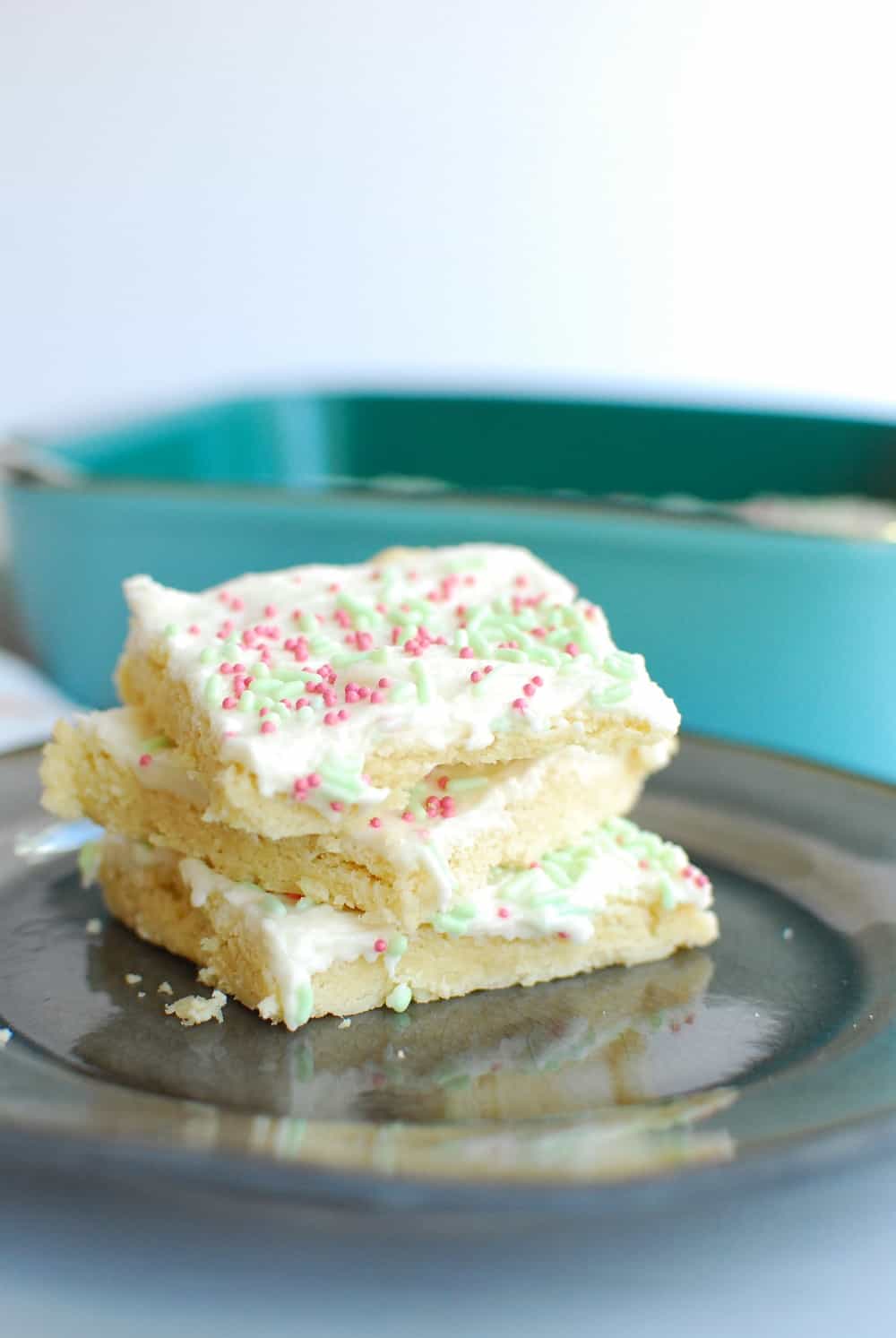 three dairy free sugar cookie bars on a plate