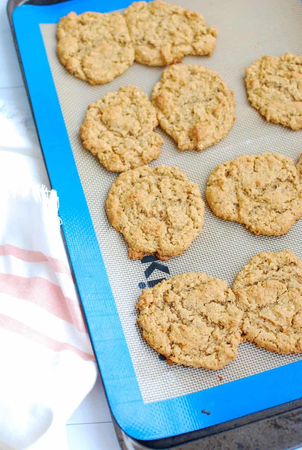 A baking sheet full of almond flour peanut butter cookies