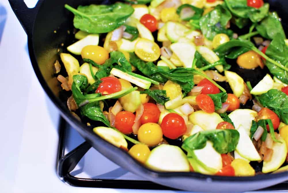 Sauteing vegetables in a cast iron skillet