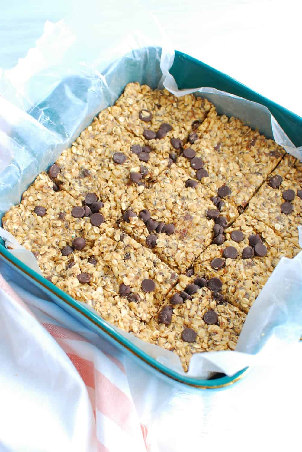 An 8x8 pan filled with granola mixture