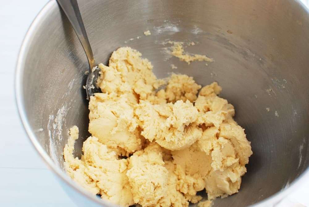 Sugar cookie dough in a mixing bowl