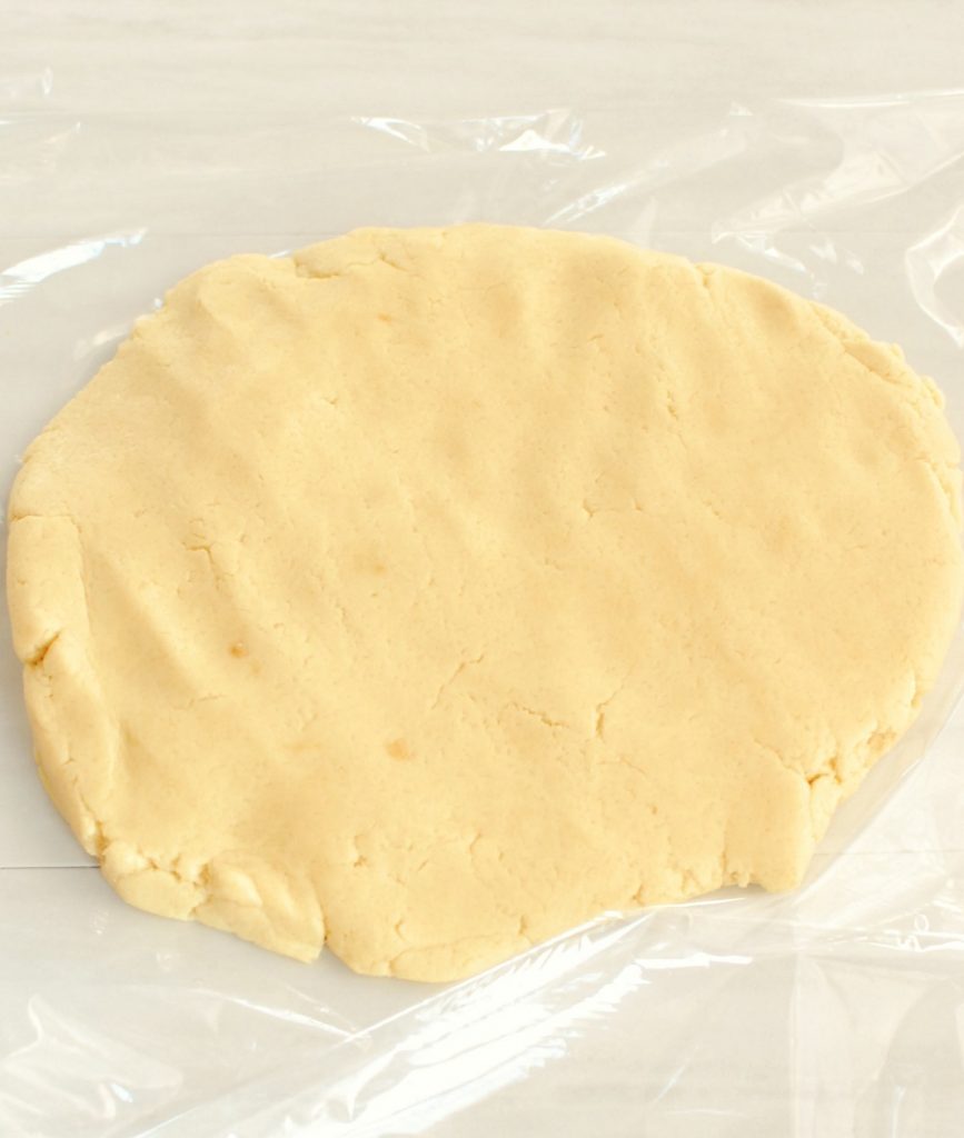 Disc of sugar cookie dough.