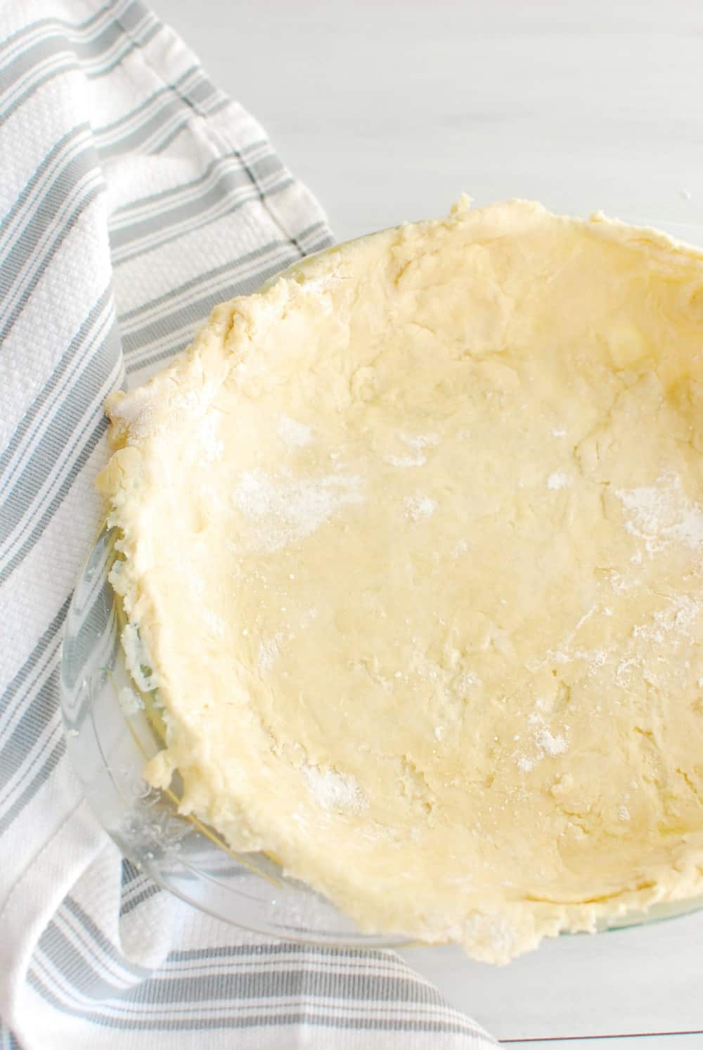 A dairy free pie crust made with dairy free butter in a pie plate