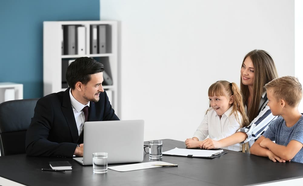 Woman meeting with principal for a 504 plan meeting