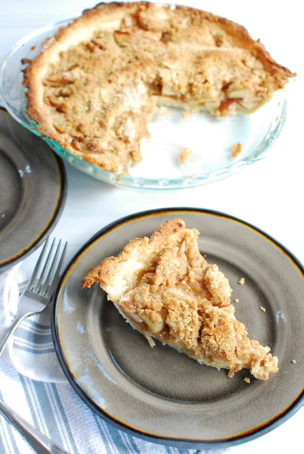 A dairy free apple pie slice on a plate