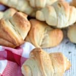 dairy free crescent rolls on a table next to a red napkin