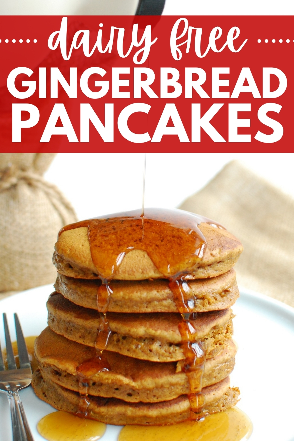 a stack of gingerbread pancakes with syrup being poured over the top