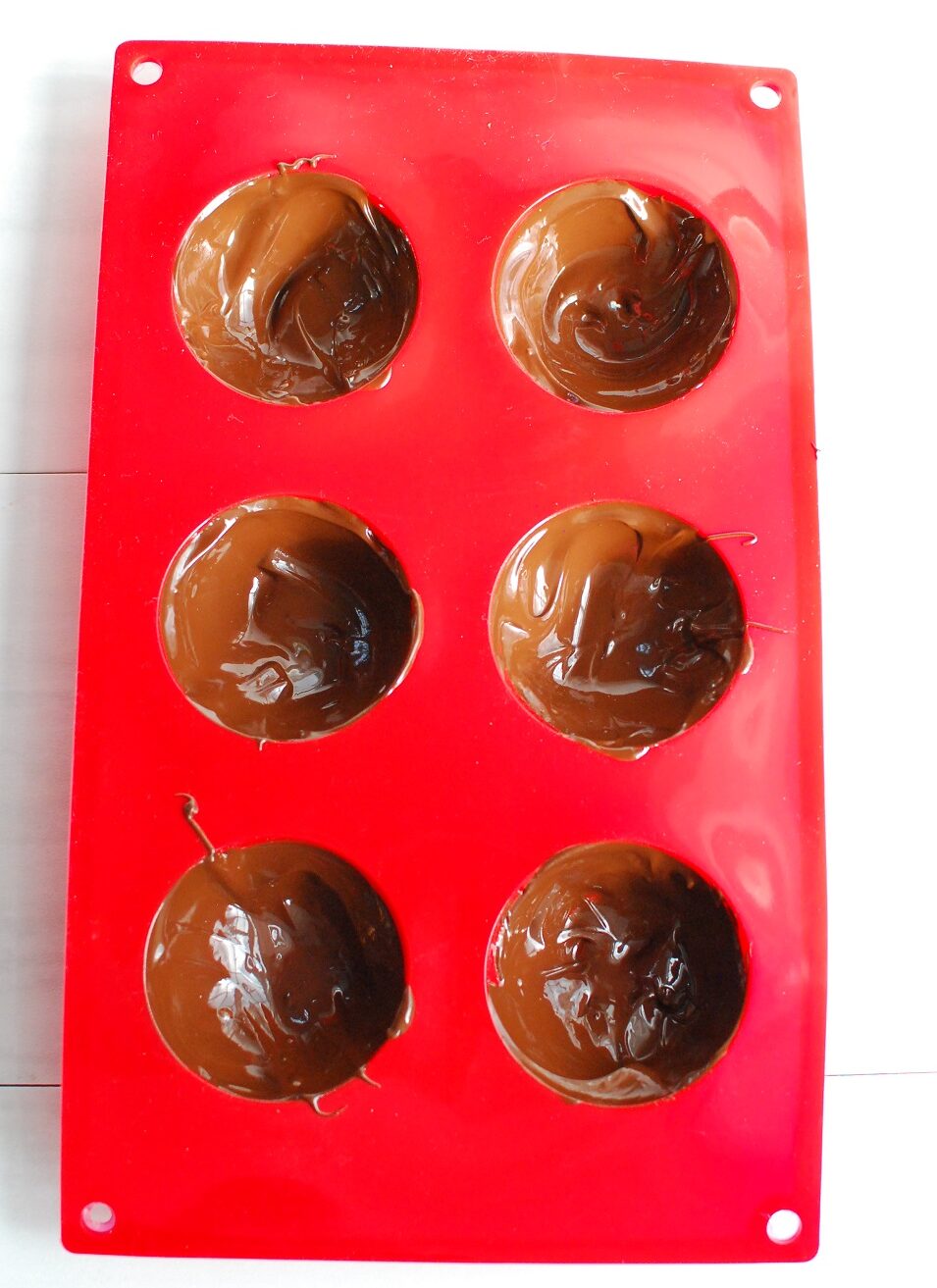 chocolate spread into a silicone dome mold