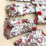 pieces of dairy free chocolate bark on parchment paper