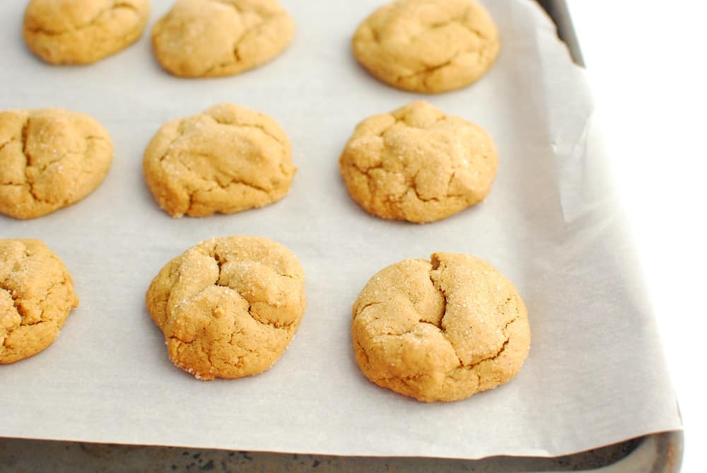 a pan with freshly baked molasses cookies