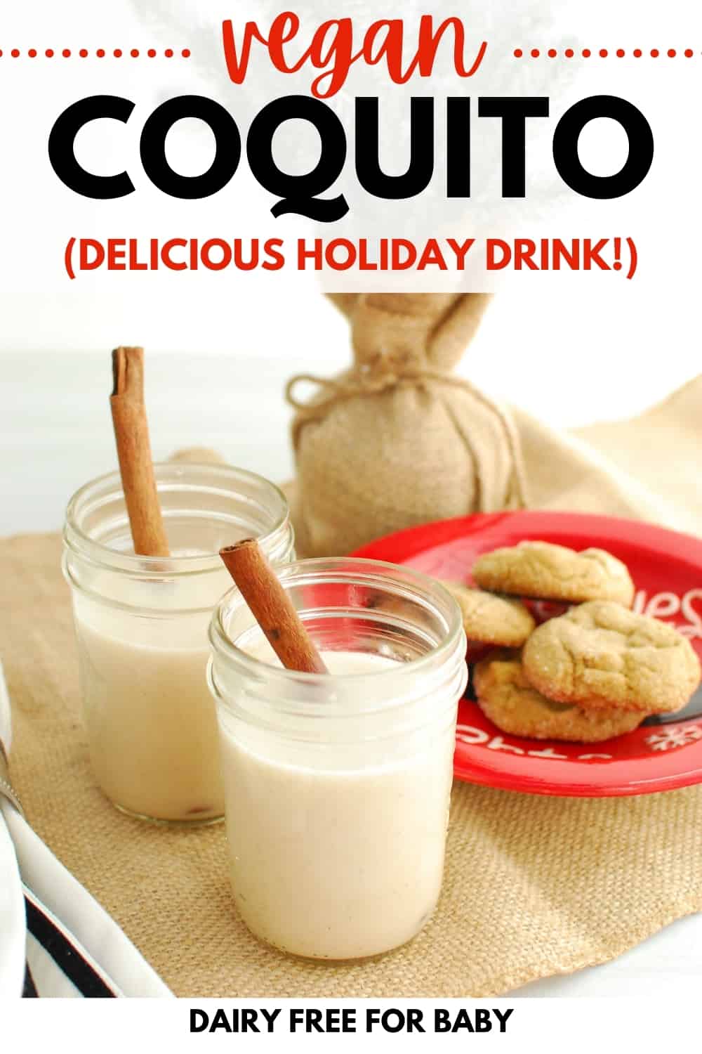 two small glasses of vegan coquito next to a plate of cookies