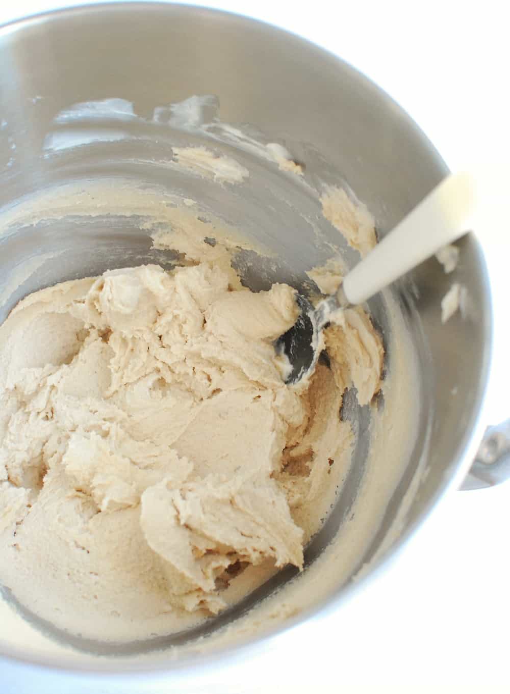 Dairy free butter and sugar creamed together in a mixing bowl.