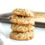 A stack of four tahini oatmeal cookies.