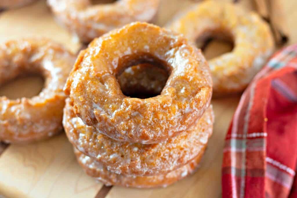 A close up of a dairy free pumpkin donut.