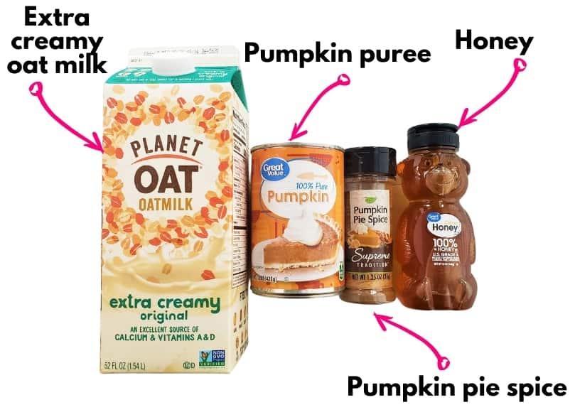 A container of oat milk, a can of pumpkin, pumpkin pie spice, and a honey bear.