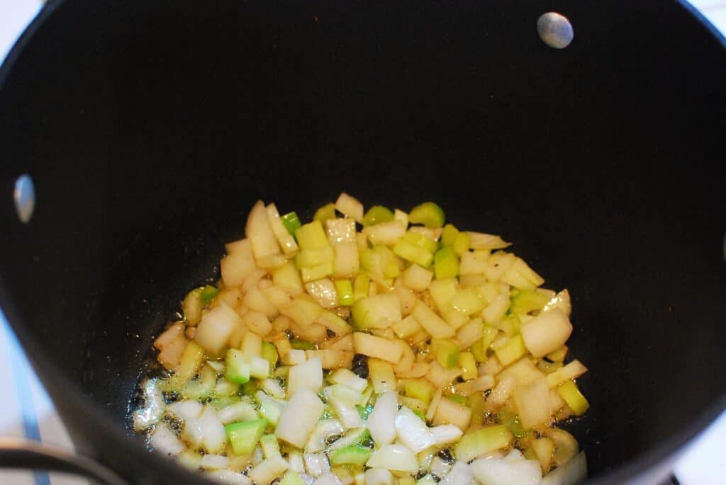 Vegetables being sautéed in bacon grease. 