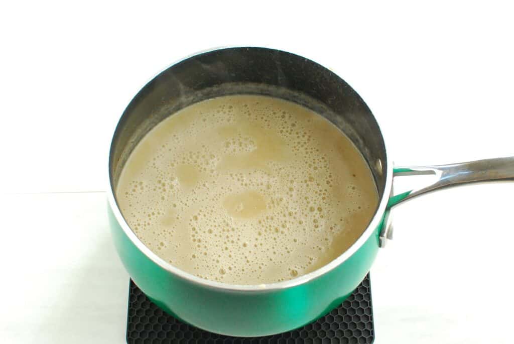 A pot with hot dairy free eggnog.