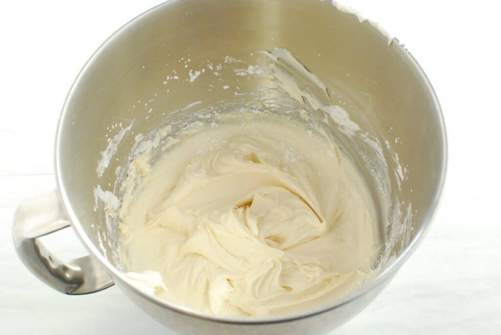 Frosting in a mixing bowl.