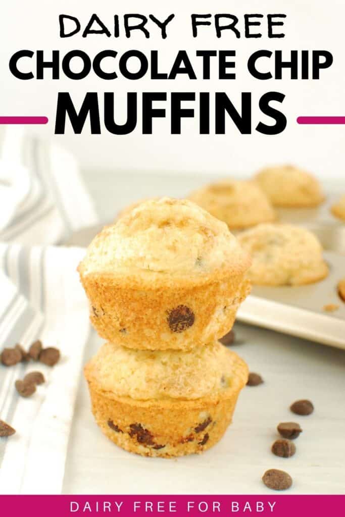 Two dairy free chocolate chip muffins, next to a muffin tin and a striped napkin.