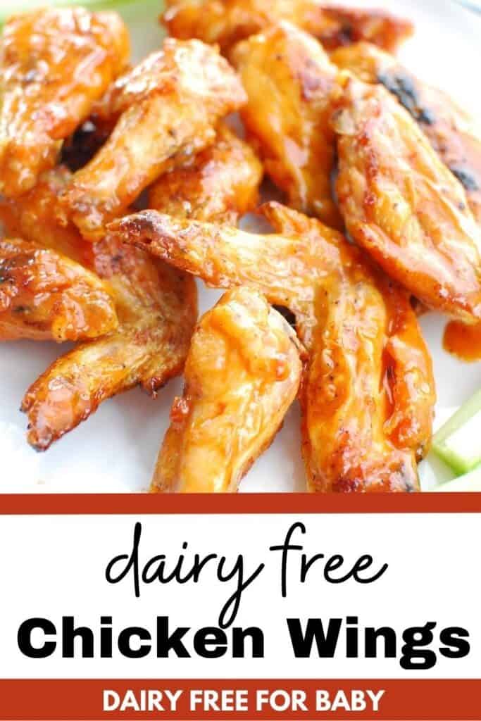 Several dairy free buffalo chicken wings on a white plate.