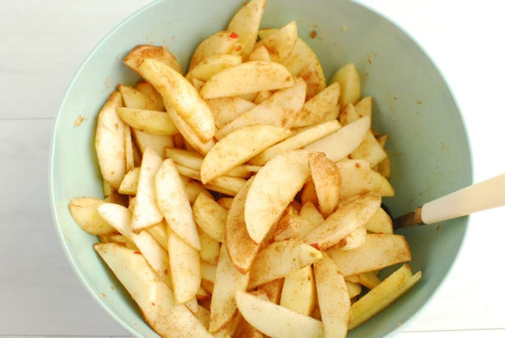 Apple crisp filling in a bowl.