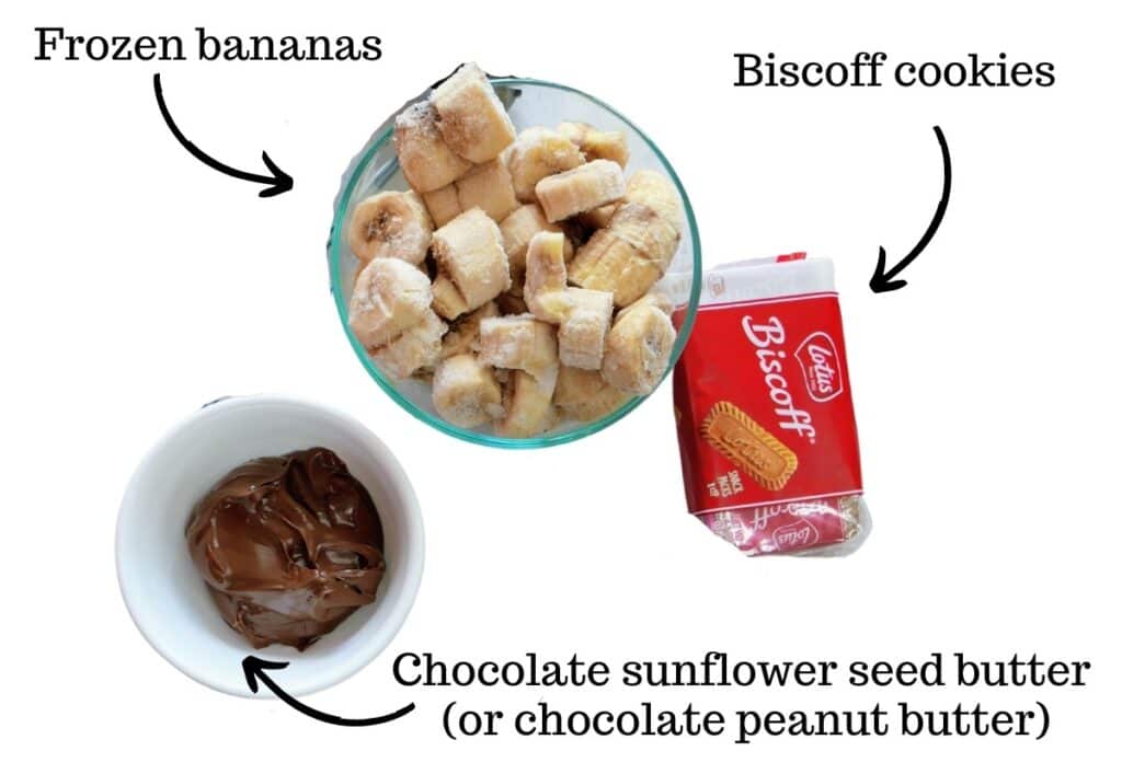 Frozen bananas, biscoff cookies, and chocolate sunflower seed butter on a white backdrop.