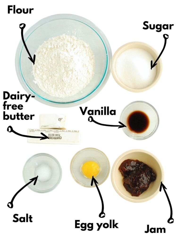 Flour, sugar, dairy-free butter, vanilla, salt, egg yolk, and jam.