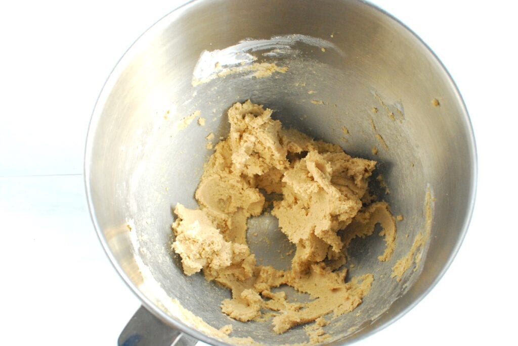 Dairy free butter and brown sugar creamed together in a mixing bowl.