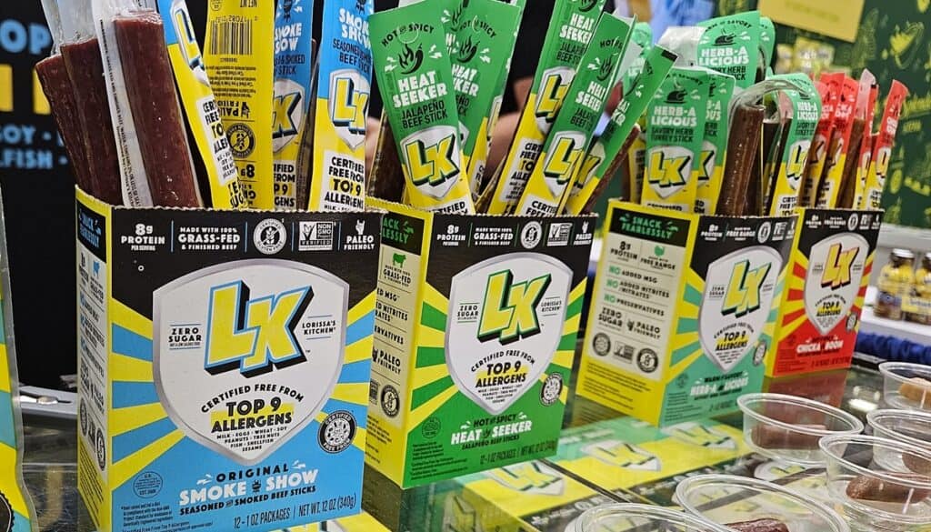 Several boxes of Lorissa's Kitchen Meat Sticks.