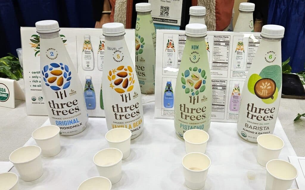Several types of dairy free milk from Three Trees, including pistachio milk.