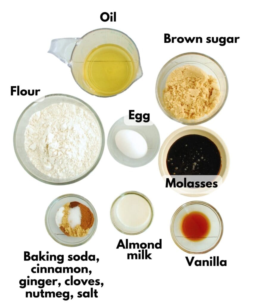 Flour, oil, brown sugar, molasses, egg, vanilla, almond milk, baking soda, cinnamon, ginger, nutmeg, cloves, and salt.