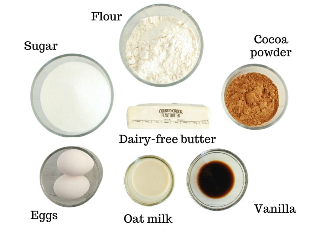 Dairy free butter, sugar, flour, cocoa powder, eggs, oat milk, and vanilla.