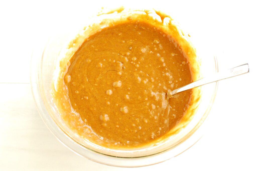 Gingerbread cupcake batter in a mixing bowl.