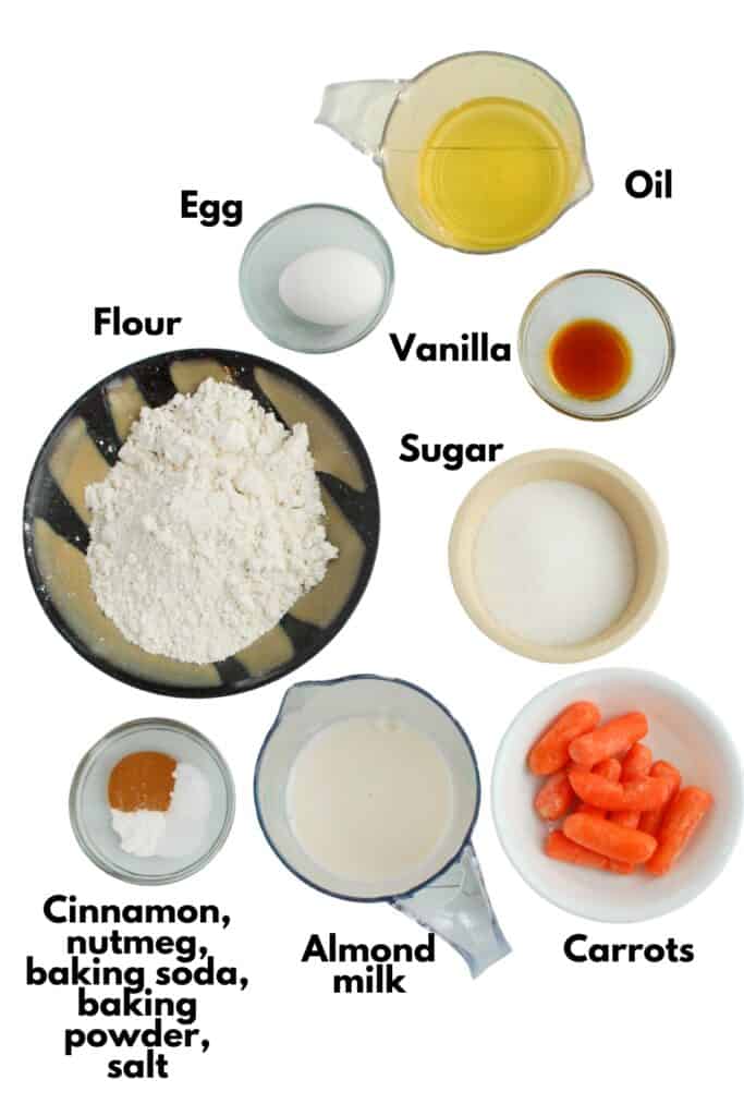 Flour, egg, oil, vanilla, sugar, cinnamon, nutmeg, baking powder, baking soda, salt, almond milk, and carrots.