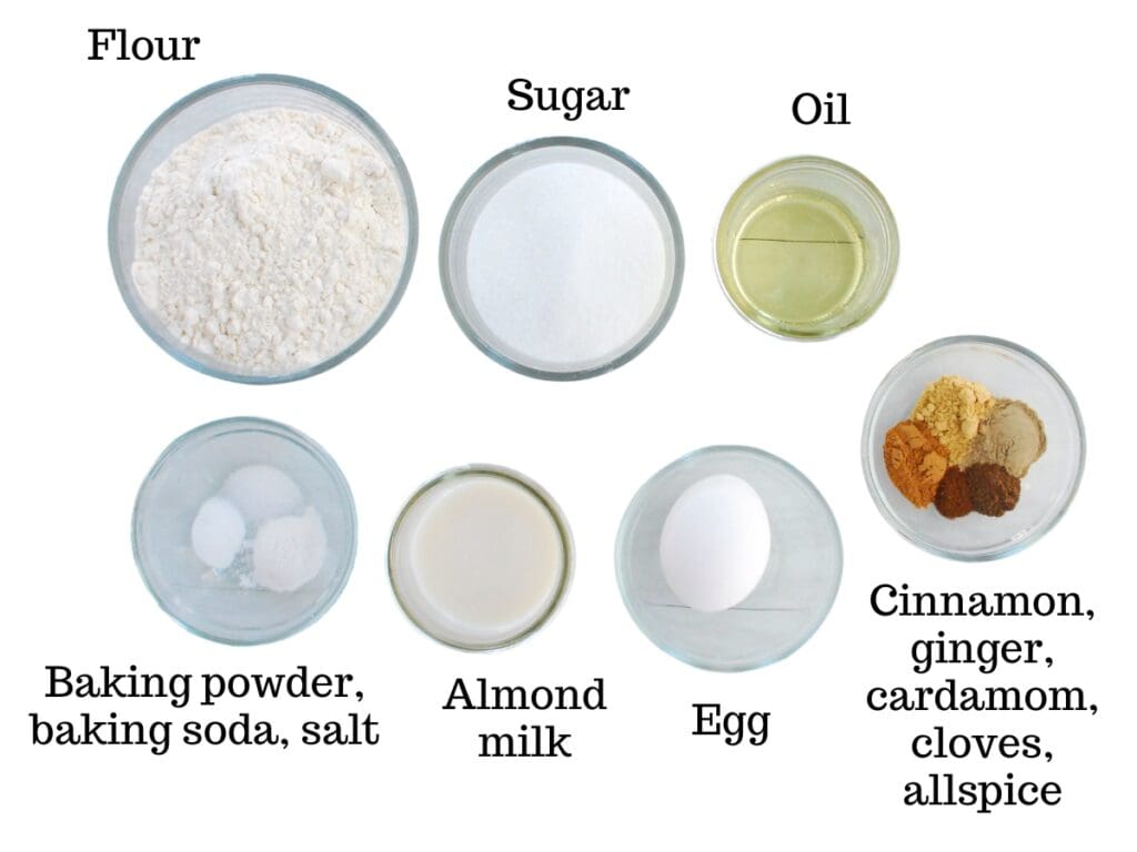 Flour, baking powder, baking soda, chai spices, salt, sugar, oil, almond milk, and an egg.