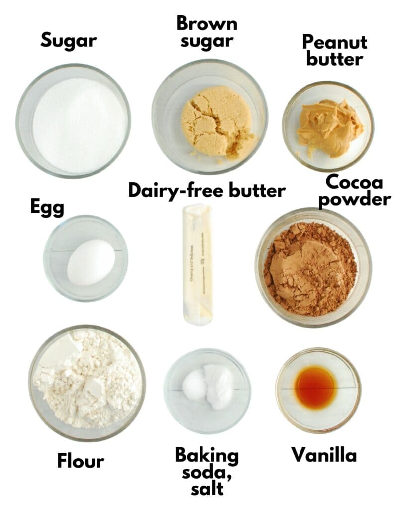 Sugar, brown sugar, peanut butter, dairy-free butter, egg, cocoa powder, flour, baking soda, salt, and vanilla.