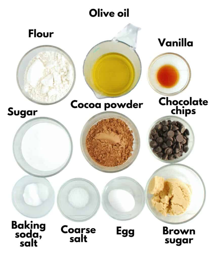 Flour, olive oil, vanilla, sugar, cocoa powder, chocolate chips, baking soda, salt, egg, and brown sugar.