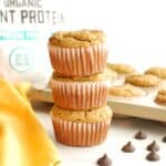 A stack of three dairy free gluten free banana protein muffins.