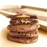 A stack of dairy free peanut butter stuffed chocolate cookies.