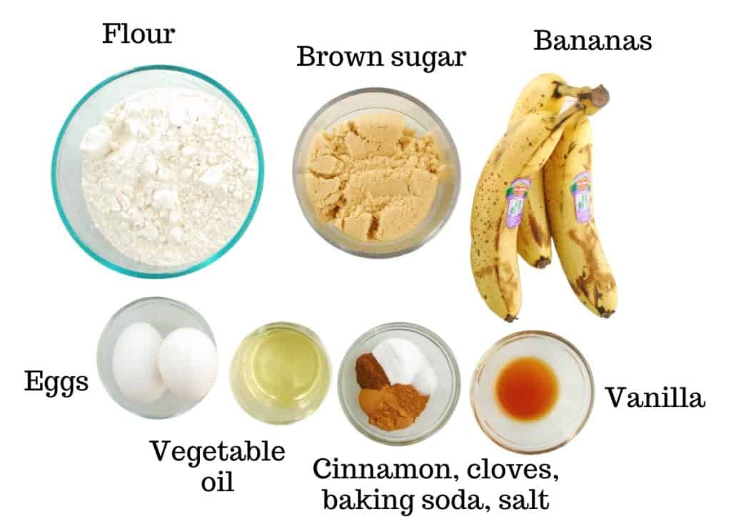 Bananas, flour, brown sugar, eggs, vegetable oil, vanilla, cinnamon, cloves, baking soda, and salt.