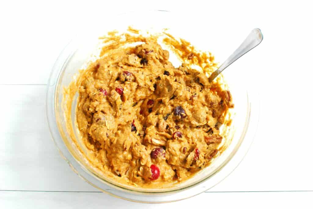 Muffin batter in a glass mixing bowl.