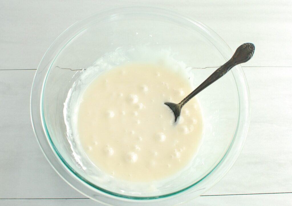 Powdered sugar icing in a bowl.