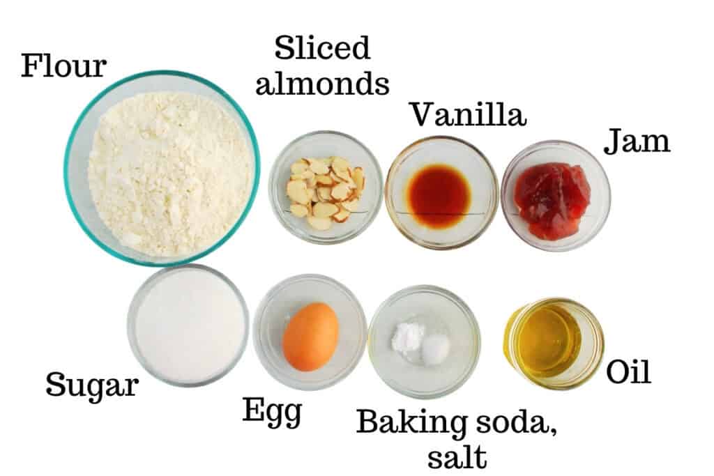 Flour, almonds, vanilla, jam, sugar, egg, baking soda, salt, and olive oil.