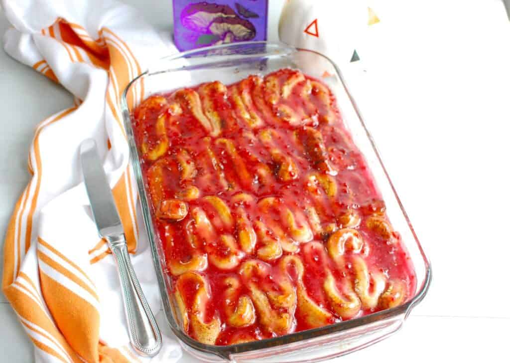 A baking dish with Halloween zombie guts cinnamon rolls.