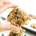 A hand holding a dairy free trail mix cookie.