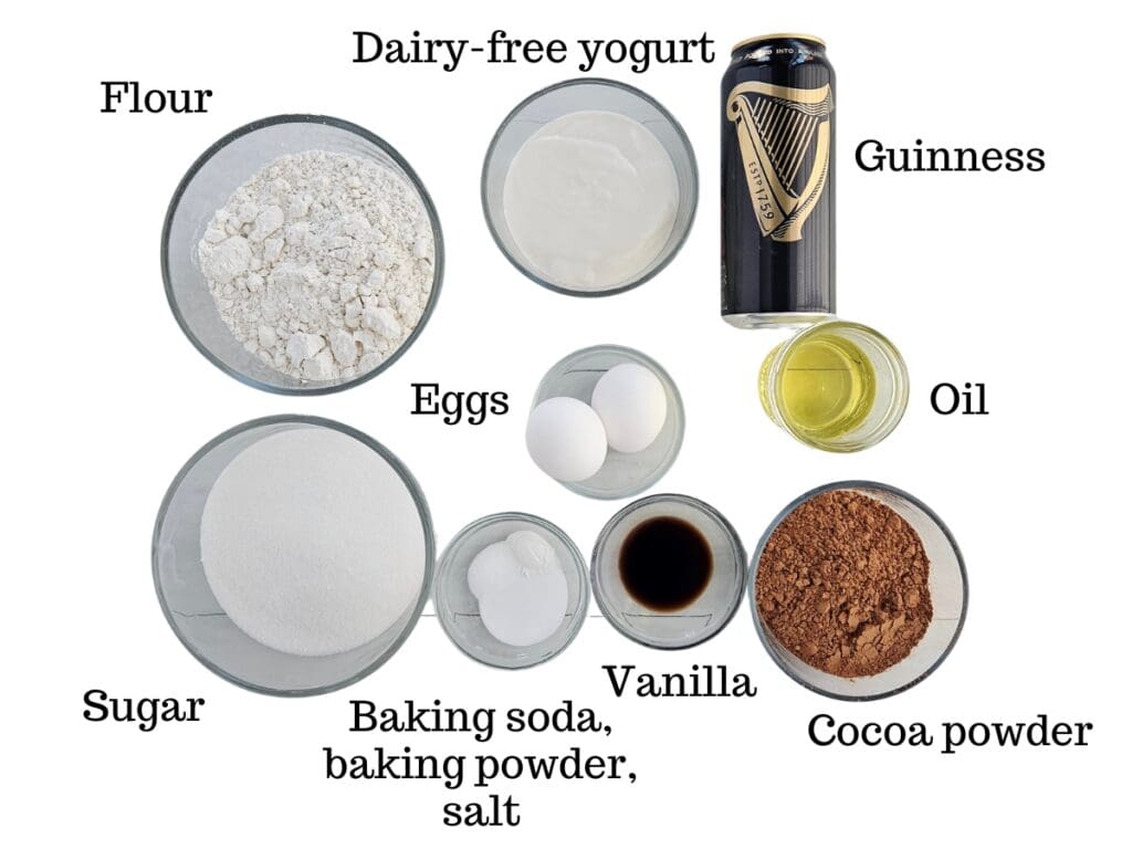 Flour, dairy-free yogurt, Guinness, sugar, eggs, oil, vanilla, cocoa, baking soda, baking powder, and salt.