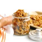 Dairy free sweet potato granola in a small glass jar.